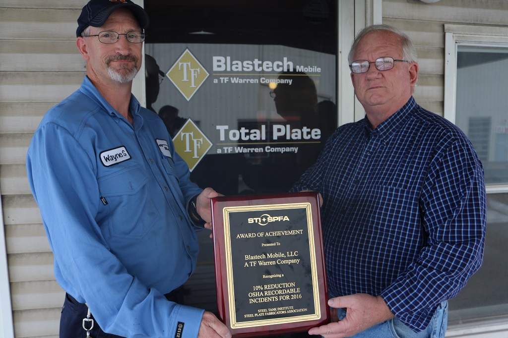 Wayne Smith and Andy Walter with Blastech Mobile holding STI/SPFA Safety Award for 2016